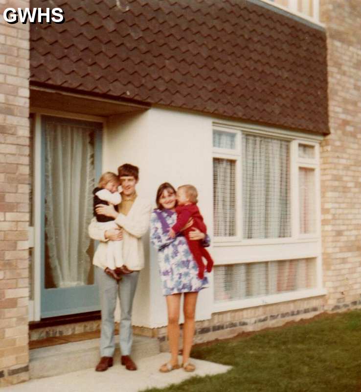 34-577 Ron Chapman and my wife Yvonne, and children Samantha and Vicki standing outside our new house at 11 Tyringham Rd, Wigston in 1972