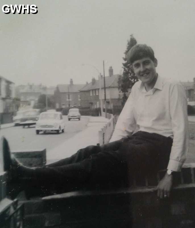 34-580 Ron Chapman lying along wall outside front of 69 Moat Street, Wigston – mid -1970s