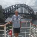 34-581 Ron Chapman on cruise ship with Sydney Harbour Bridge in background