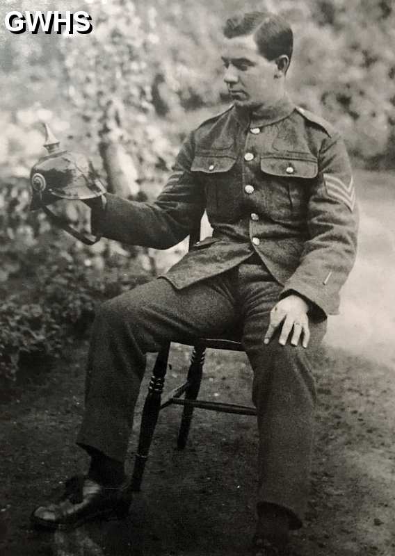 35-587 Sergeant Boulter with German helmet.