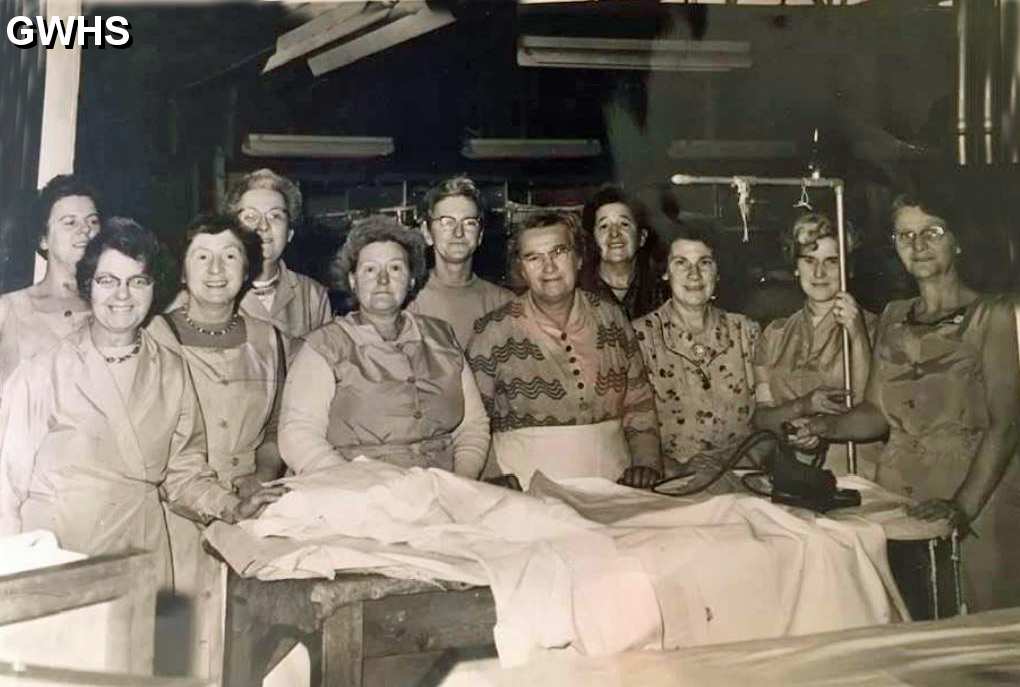 35-719 Isabel mawby 3 rd from the left with her work mates at the Wigston laundry