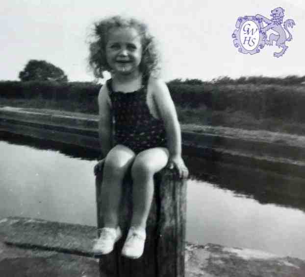 32-146 Gloria Wright age 3 by the canal in Wigston. circa1955