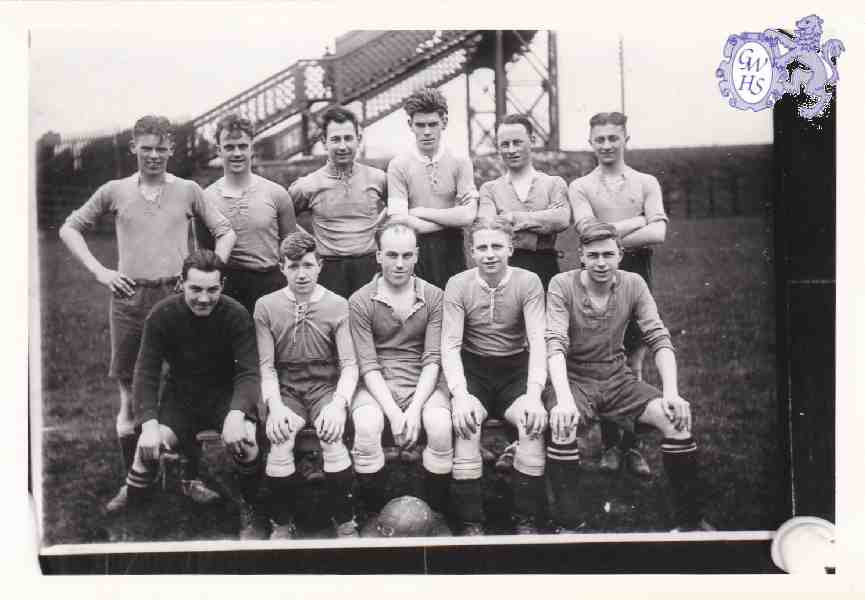 9-50 Football Team with the Rally Bridge in the background