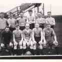 9-50 Football Team with the Rally Bridge in the background