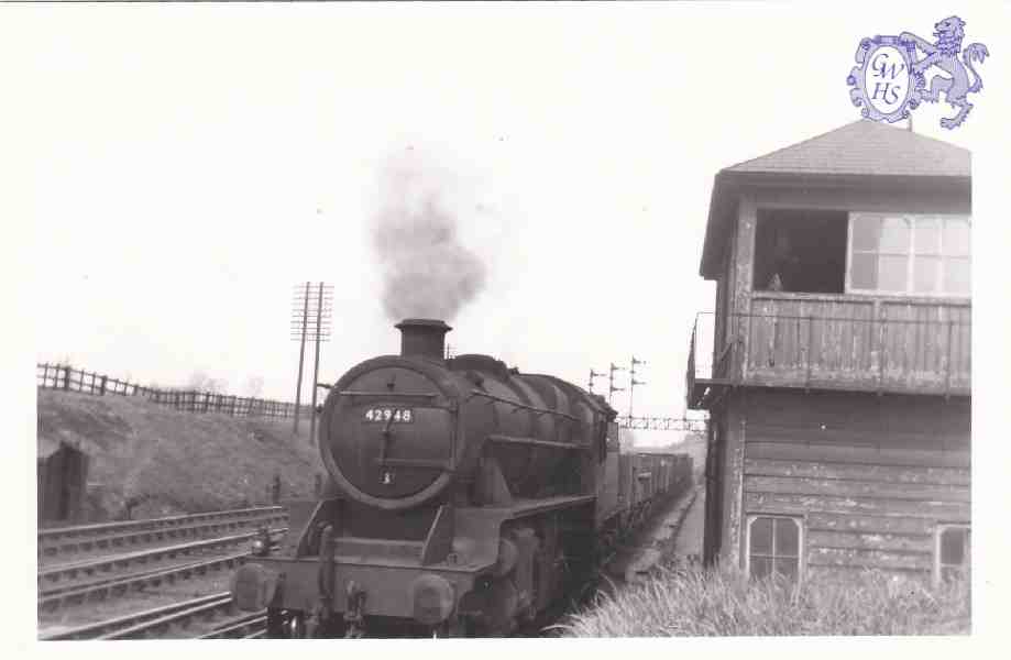 7-127 42948 pulling freight wagons though Wigston