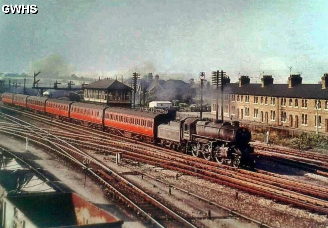 30-717 Passenger Train passing Midland Cottages - Twenty Row going south circa 1958