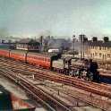 30-717 Passenger Train passing Midland Cottages - Twenty Row going south circa 1958