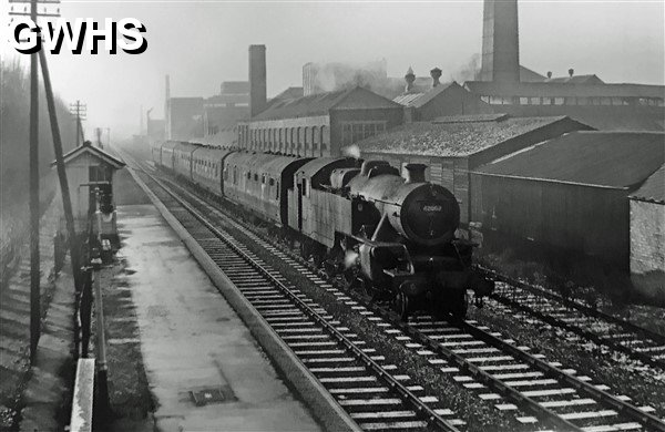 39-100 Fairburn 2-6-4T No 42062 arrives at Wigston South station 1961