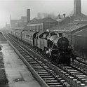 39-100 Fairburn 2-6-4T No 42062 arrives at Wigston South station 1961