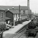 39-146 Wigsto South Station  with 2-6-4 No 42615 passing through in 1954
