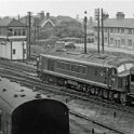 39-153 This D20 pulls an express passenger train past 20 Row in 1961
