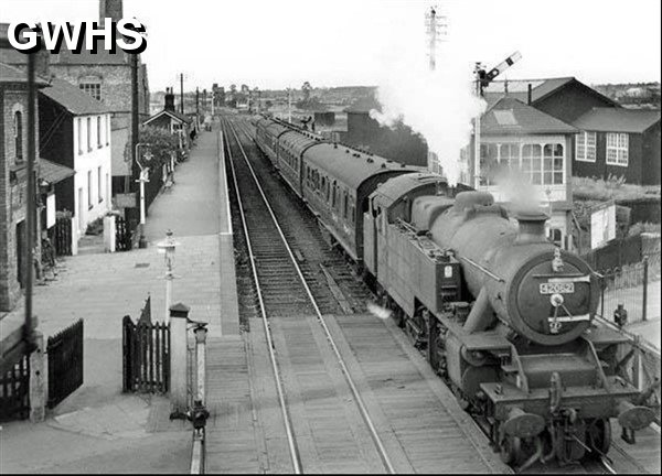 34-327 class B stopping train from Leicester approaches the staggered up platform at Wigston South station in 1961