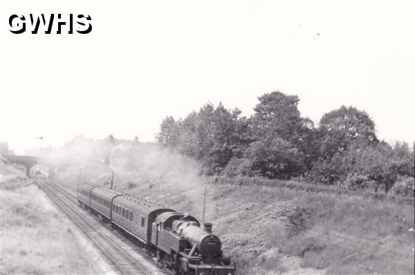 7-167 class 2P 4-4-0 Fowler locomotive 40447 leaving Wigston Glen Parva Station on it's way to Leicester 1957