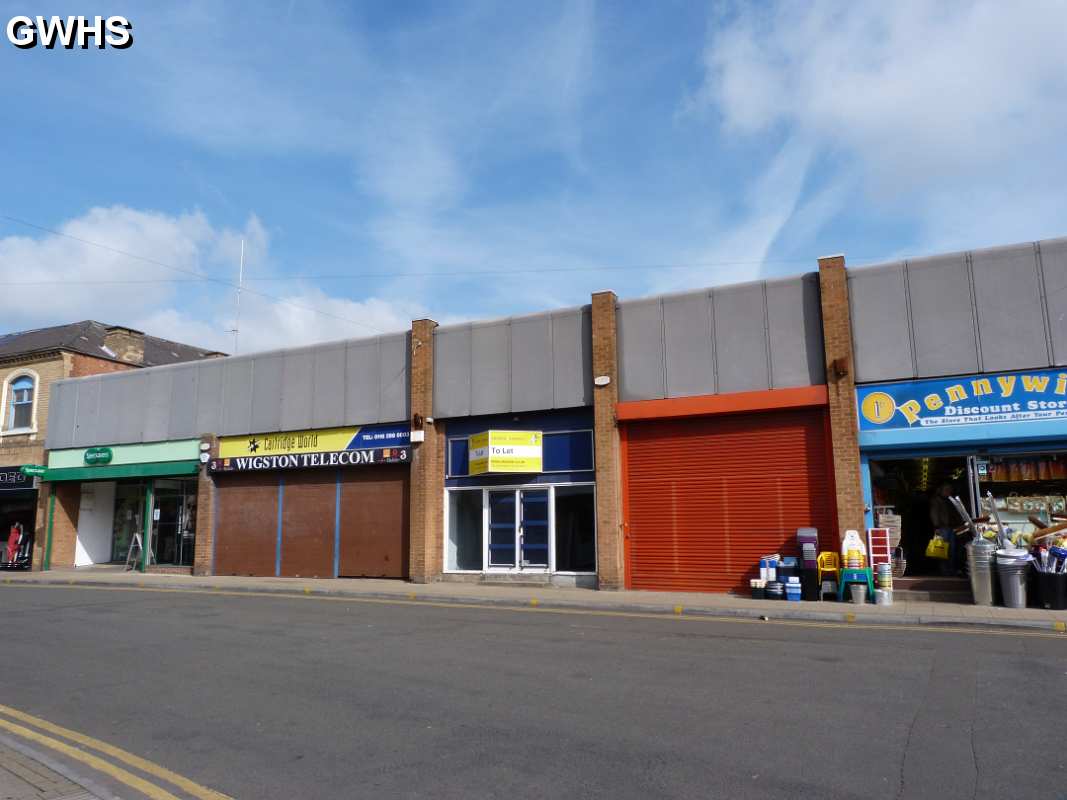 19-256 3 vacant shops and Specsavers Bell Street Wigston Magna April 2012