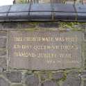 19-089 Plaque on All Saint's Church wall Moat Street Wigston Magna Feb 2012