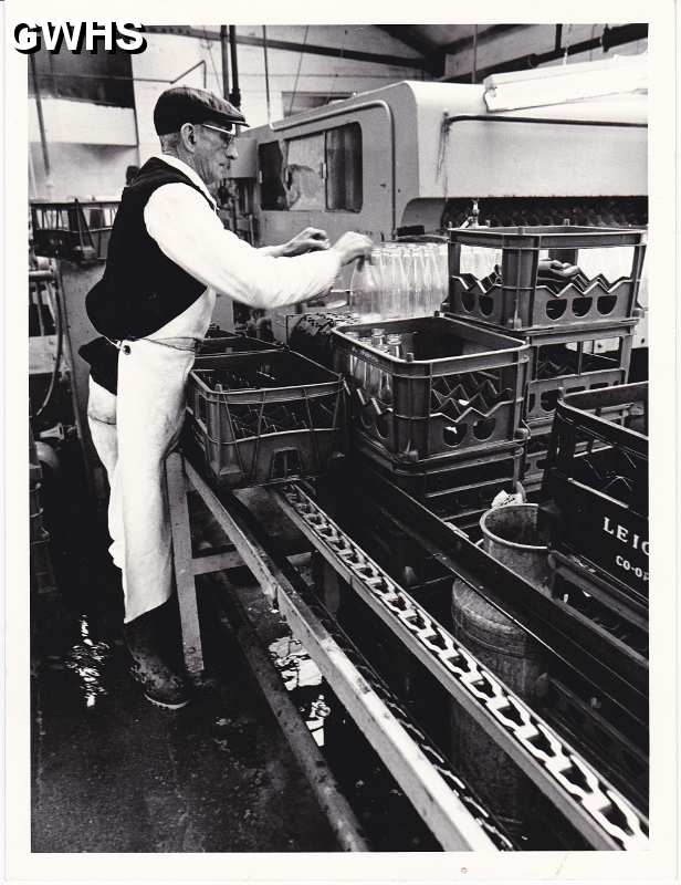 6-45 Harold Abbott at the bottling machine in the Dairly in Wigston in 1968