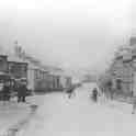 23-013 Welford Road  Wigston Magna looking north - men on left watching football 1900's