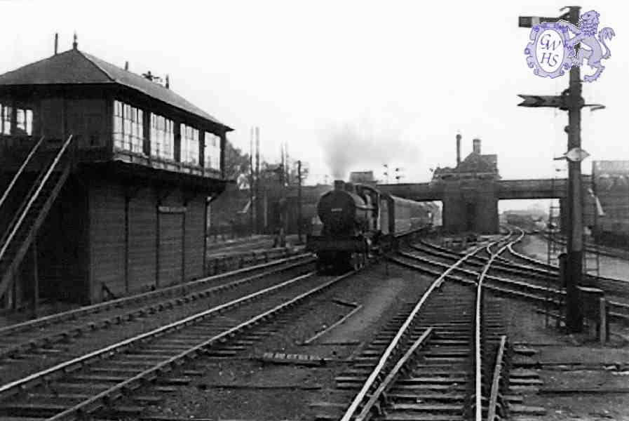 28-023 A three cylinder 4-4-0 pulls away from Wigston Magna station in the the early 1950's.  (JDS Collection)